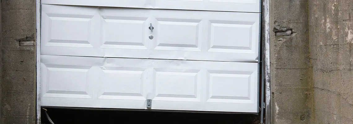 Garage Door Got Hit By A Car Dent Removal in Barrie, ON