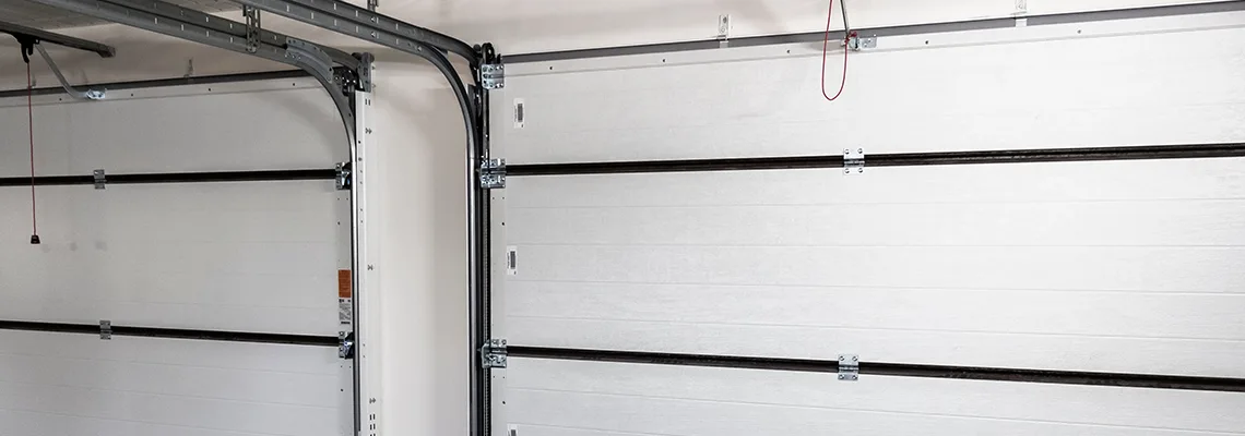 Fix Folding Garage Door Jerking in Barrie, Ontario