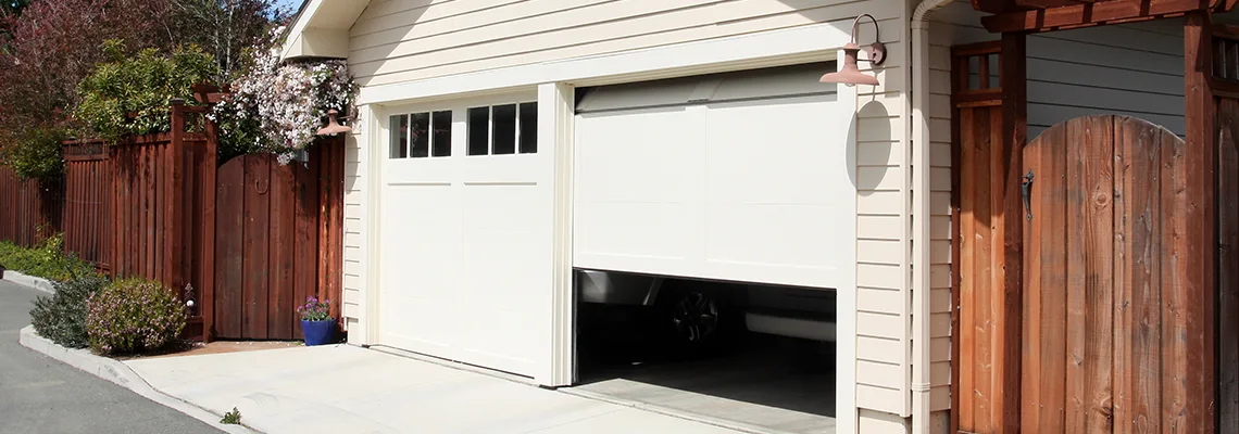 Fix Metal Garage Door Jerking in Barrie, Ontario